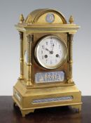 A 19th century French ormolu mantel clock, inset with jasper ware plaques, dial signed JW Benson,