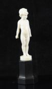 Ferdinand Preiss (1882-1943). An Art Deco carved ivory figure of a small girl, originally holding