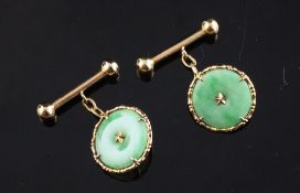 A pair of 20th century Chinese gold and jadeite disc cufflinks. Starting Price: £240