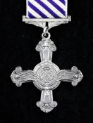An unattributable Distinguished Flying Cross dated 1944. Starting Price: £400