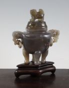 A Chinese agate two handled vase and cover, the flattened body with lion mask ring handles and
