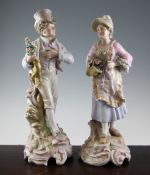 A pair of large Continental porcelain figures, early 20th century, each modelled as a gentleman