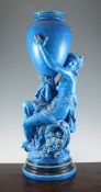 A large Minton majolica turquoise glazed figural vase, c.1872, after a model by A. Carrier, the