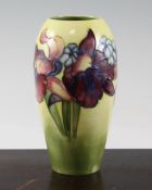 A Moorcroft `Orchid` ovoid vase, c.1960, on graduated green to yellow ground, inscribed `W.M`