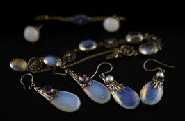 A gold and moonstone set bracelet, with alternating flowerhead and cabochon moonstone links and