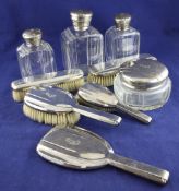 A French 1930`s Art Deco 950 standard silver mounted nine piece dressing table set, with engraved