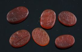 Six unmounted carnallite oval seals, each carved with Persian script, 0.75in et infra. Starting