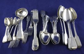 A 19th century matched part suite of silver fiddle pattern flatware, with engraved initial,