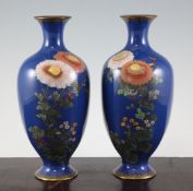 A pair of Japanese cloisonne enamel baluster vases, early 20th century, each decorated with