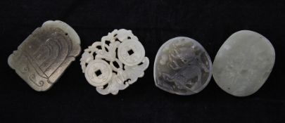 Four Chinese jade carvings, the first an oval plaque of celadon jade plaque of pale celadon tone,