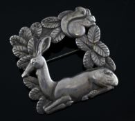 A 1970`s Georg Jensen sterling silver deer and squirrel brooch, design no. 318, of square form, 1.