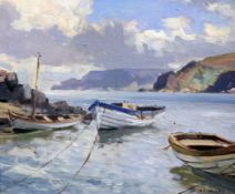 § Maurice Wilks (1910-1984)oil on canvasboard,`Boats at Rockport, Cushendon`signed,11.5 x 13.5in.