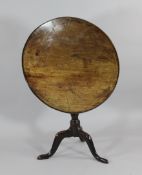 A late 18th century mahogany circular tilt top table, on tripod base, W.2ft 6in. Starting Price: £