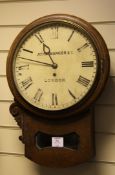 An early Victorian oak drop case wall clock, with painted dial signed John Manger & Co., London, and