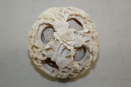 A 19th century Chinese carved ivory concentric ball, 2.75in. Starting Price: £160