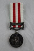 An 1858 India Mutiny medal with Lucknow clasp to Serj Henry Buckley 7th Hussars Starting Price: £