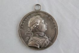 A later casting of a George III 1773 Carib War medal 55mm Starting Price: £120