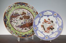 A Chinese enamelled dish, Qianlong period, the centre decorated with a scroll, flowers and a bowl of