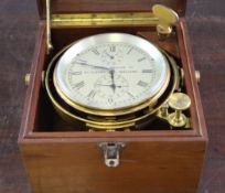 A Thomas Mercer 2½ day marine chronometer, with silvered Roman dial with state of wind and