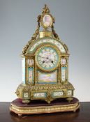 A 19th century French ormolu and Sevres style porcelain mantel clock, of architectural form, inset