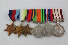 Three WW2 medal groups; R.A, RAF, and Canada comprising group of six with ISM and LSGC to W.O C.L.