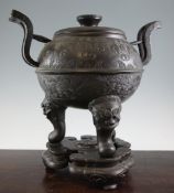 A large Chinese bronze censer and cover, Ding, cast and chased with taotie masks and scrolls,