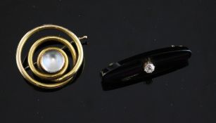 Two 14ct gold Russian gem set brooches, diamond set onyx of navette form and moonstone set whorl