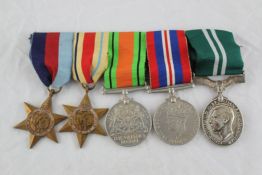 Three WW2 medal groups; Volunteer Medical Service, Air Efficiency and Minesweeping. Starting
