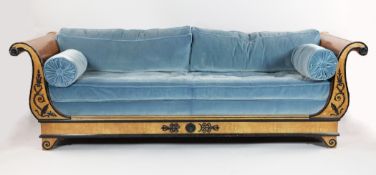 A French Empire style birds eye maple lyre end settee with ebonised scrolled foliate mounts, W.7ft
