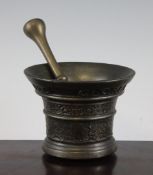 An early 18th century Dutch or German bronze mortar, "SOLI DEO GLORIA AO" (Glory to God Alone) dated