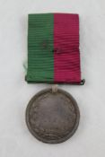An 1839 Ghuznee medal worn, with inscription erased. Starting Price: £80