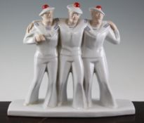 An Art Deco style group of three drunken sailors, each standing with arms around each other, on a