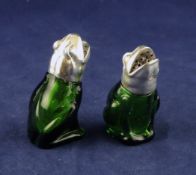 A pair of late/early 20th century German novelty silver mounted green glass pepperettes, modelled as