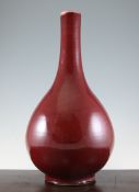 A large Chinese Sang de boeuf bottle vase, 21.5in. Starting Price: £1200