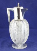 An Edwardian silver mounted hobnail cut glass claret jug, of ovoid form, with angular handle and