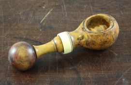 A 19th century treen, burrwood and ivory nutcracker, 6in. Starting Price: £160