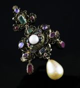 An ornate Renaissance Revival silver gilt and multi gem set drop pendant, 3.25in. Starting Price: £