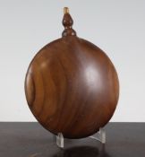 A circular walnut snuff flask, with a shaped stopper, 6.5in. Starting Price: £80