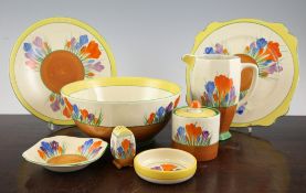 A group of Clarice Cliff `Crocus` pottery, comprising a bowl, 8.8in., an octagonal jug, 6in., a