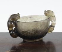 A Chinese smoky coloured quartz twin handled cup, of oval form, engraved with leiwen, the handles