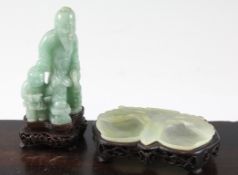 A Chinese bowenite brushwasher and a green quartz group, the brushwasher carved as twin peaches,