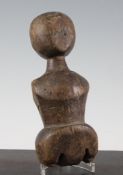 An 18th century beech doll`s head and torso, 9in. Starting Price: £80