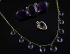 An Edwardian gold and graduated amethyst set necklace, 15in and two other items. Starting Price: £