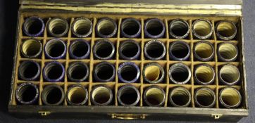 A collection of phonograph wax cylinders, within three cases and other related items including