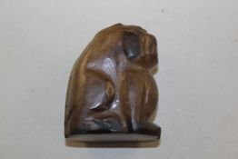 A Chinese grey and brown jade seated figure of a cat like creature, Ming Dynasty or earlier, approx.