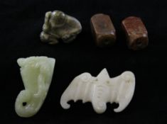 A group of five Chinese jade and bowenite carvings, comprising a pale celadon jade small rhyton,