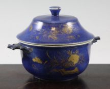 A Chinese gilt-decorated powder blue two handled bowl and cover, Kangxi period, decorated with bowls