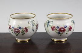 A pair of Moorcroft Macintyre `18th century` globular vases, c.1910, each with white ground,