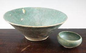 Two Kashan turquoise glazed pottery bowls, 13th / 14th century, one of conical form with partially