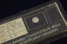 An unmounted round brilliant cut solitaire diamond, with a "Jewellery Council of South Africa